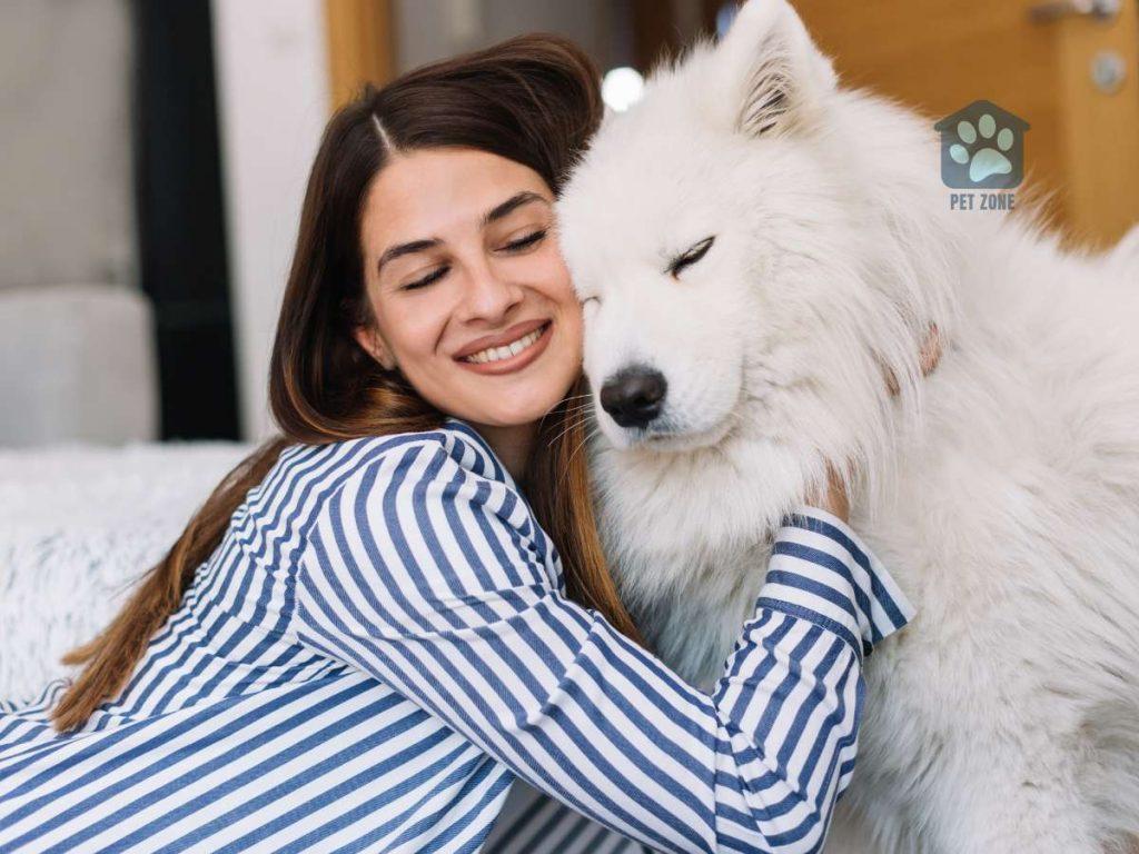 woman hugging her dog