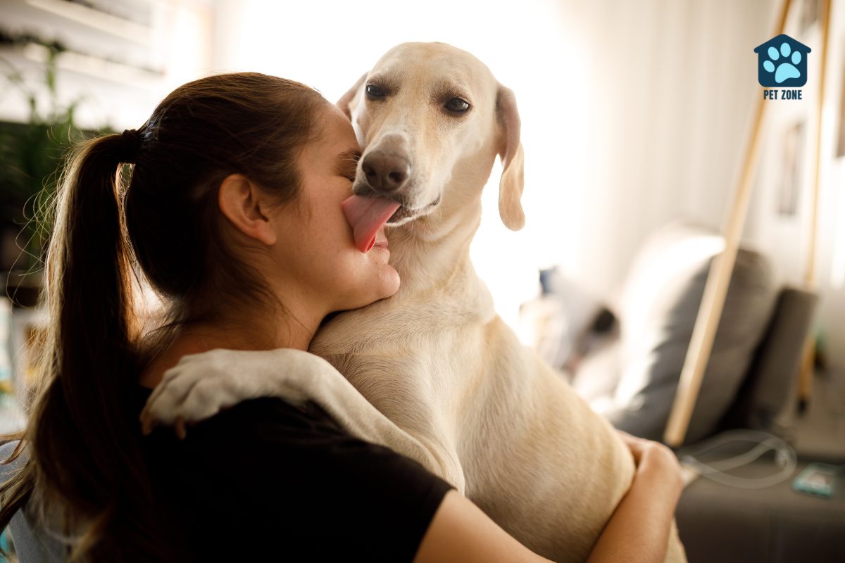 sad woman hugging dog that is licking her