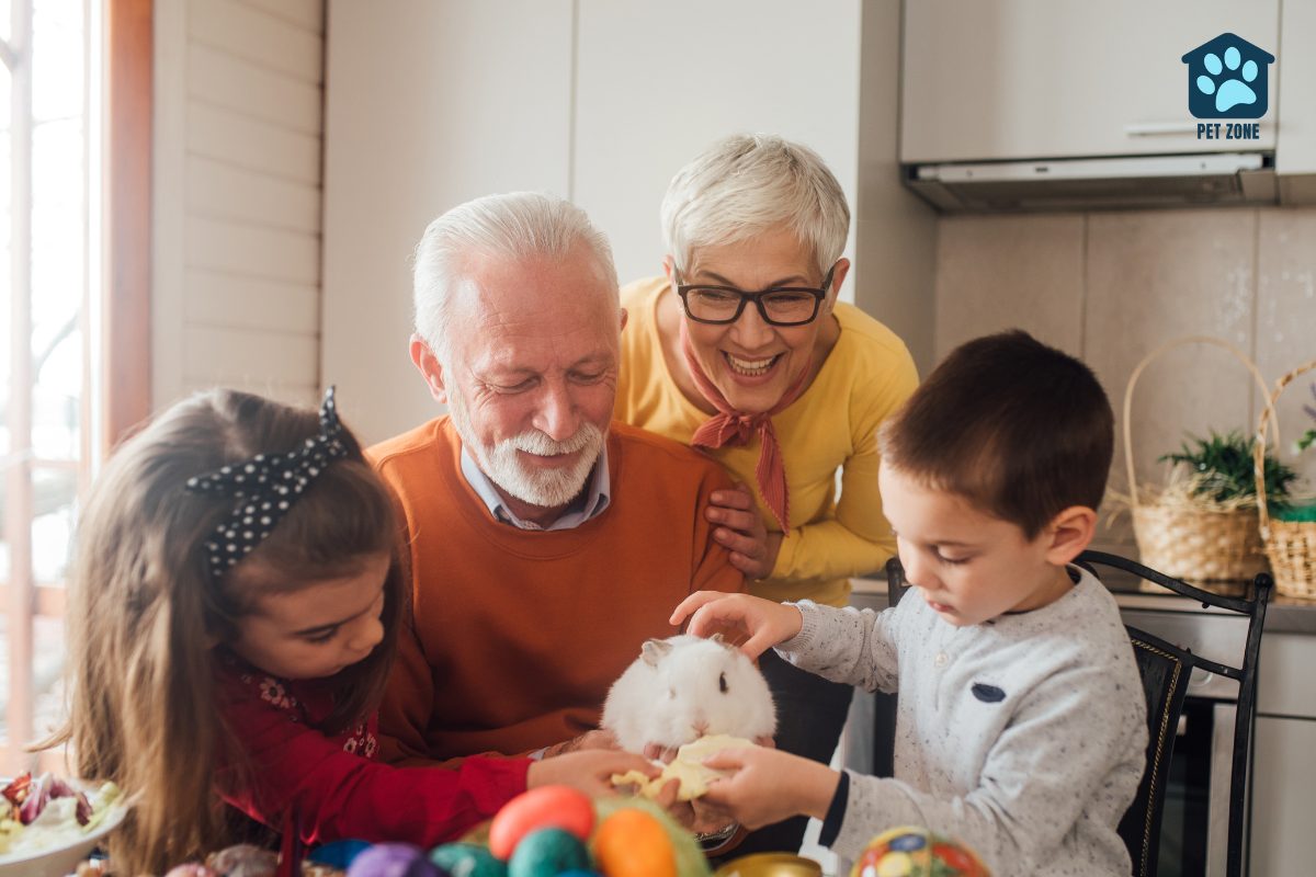 grandparents with kids holding rabbit